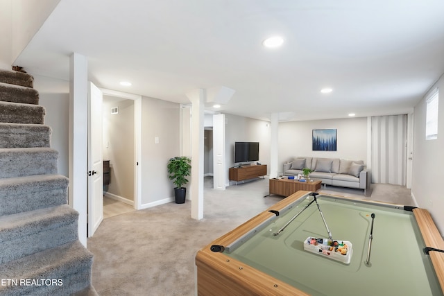 game room with light colored carpet