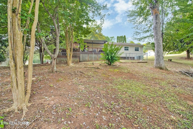 view of yard featuring a deck