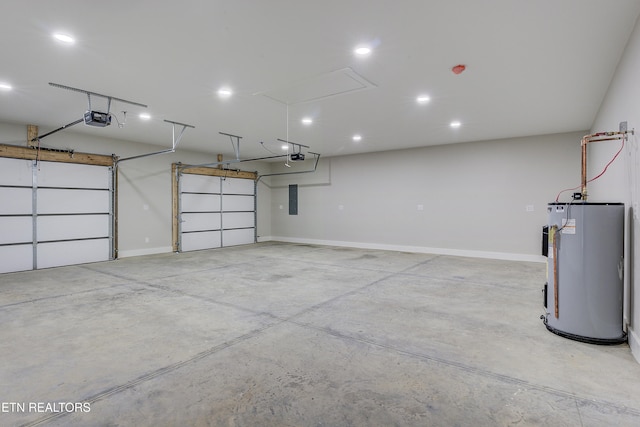 garage featuring water heater, a garage door opener, and electric panel