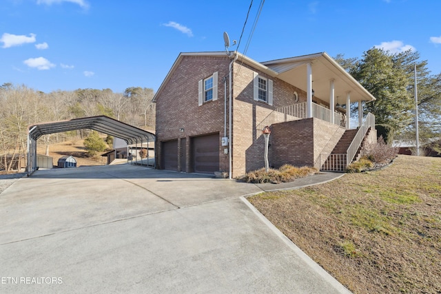 view of home's exterior with a garage, a lawn, a carport, and a porch