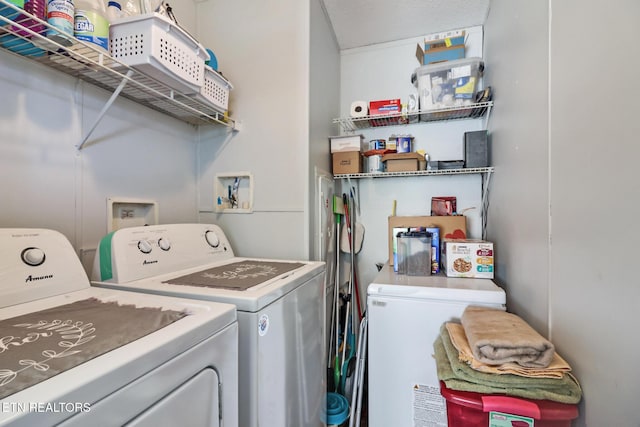 laundry room with separate washer and dryer