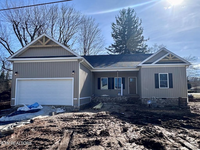 view of front of home featuring a garage