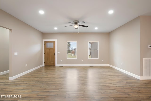 unfurnished living room featuring baseboards, a ceiling fan, recessed lighting, and visible vents