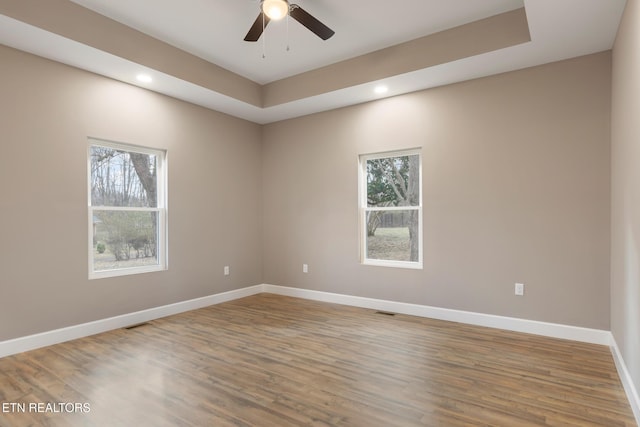 unfurnished room with recessed lighting, baseboards, ceiling fan, and wood finished floors