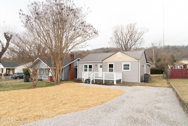 single story home featuring a front yard