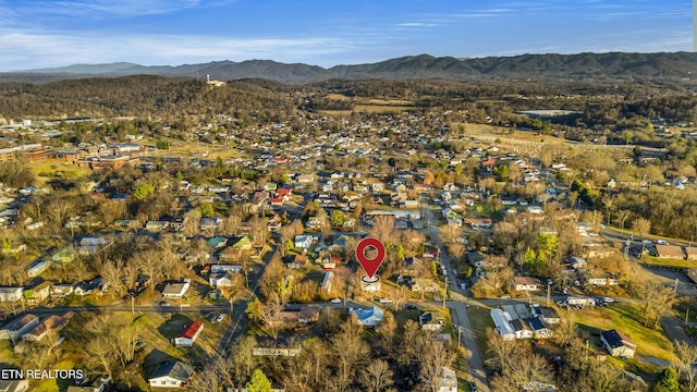 drone / aerial view featuring a mountain view