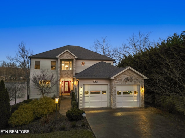 front of property with a garage