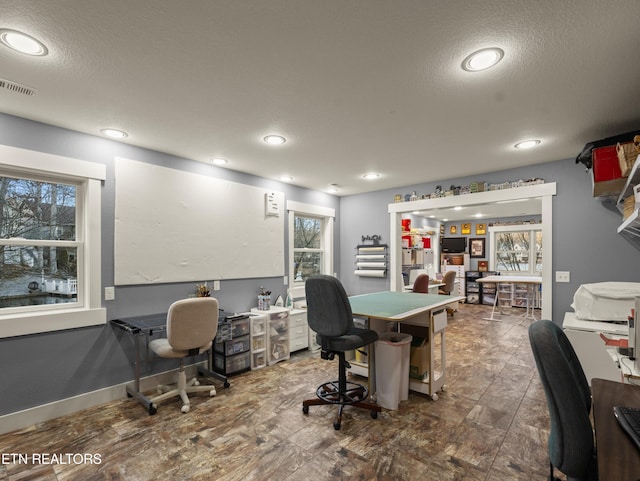 office with a textured ceiling