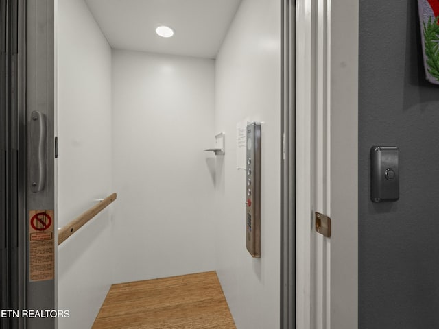 spacious closet featuring elevator