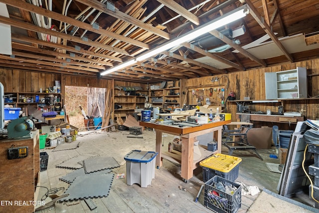 miscellaneous room with a workshop area