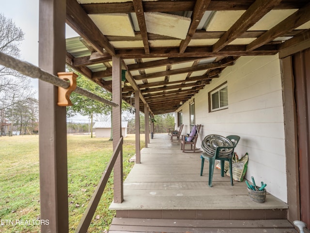 deck featuring a lawn