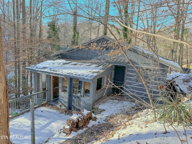 view of snow covered property