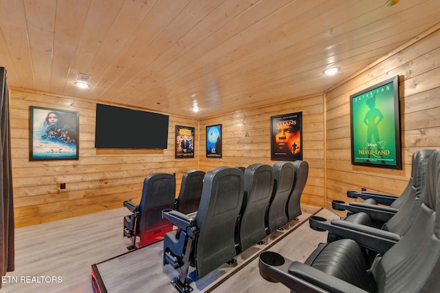 home theater featuring light hardwood / wood-style flooring and wooden ceiling