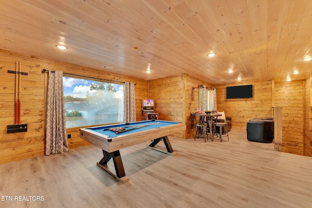 recreation room with light wood-type flooring, wooden walls, wood ceiling, and billiards