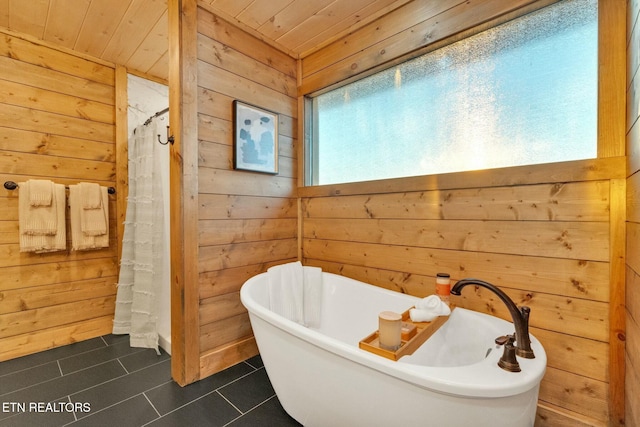 bathroom with wooden ceiling, tile patterned floors, independent shower and bath, and wood walls