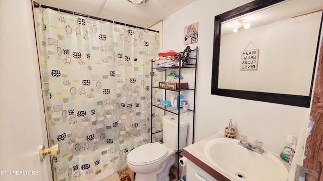 bathroom featuring vanity, toilet, and curtained shower