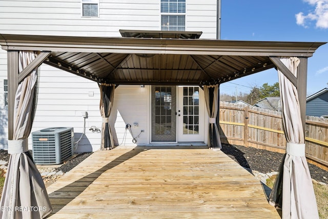 wooden terrace with a gazebo and central AC