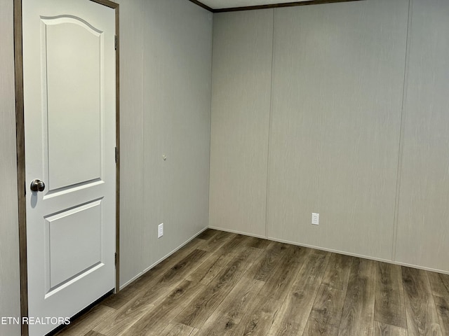 unfurnished room featuring hardwood / wood-style floors