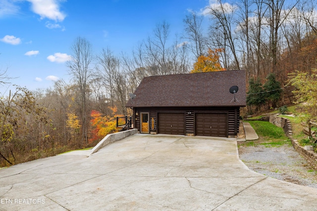 view of home's exterior with a garage