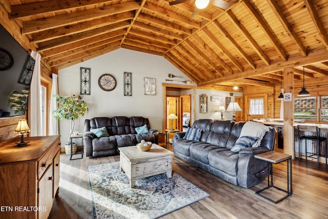 living room with vaulted ceiling with beams, wood ceiling, wood-type flooring, and ceiling fan