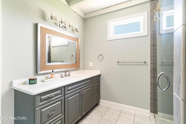 bathroom with vanity and walk in shower