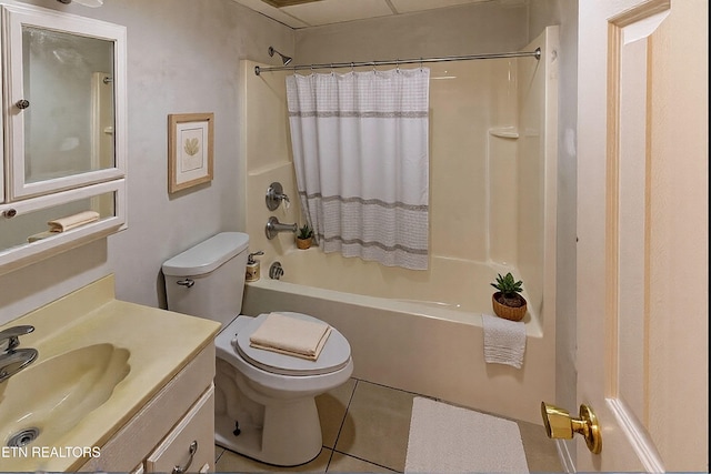 bathroom with toilet, tile patterned flooring, vanity, and shower / bathtub combination with curtain