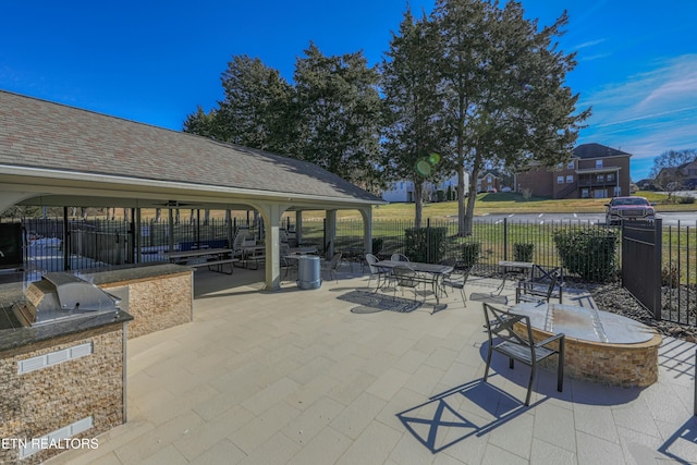 view of patio featuring a gazebo and an outdoor kitchen