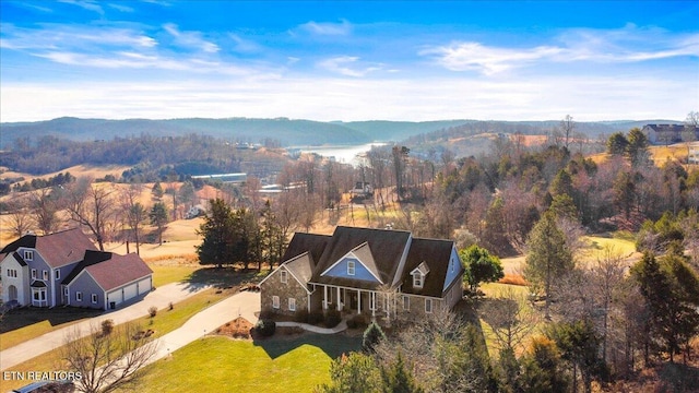 drone / aerial view featuring a mountain view