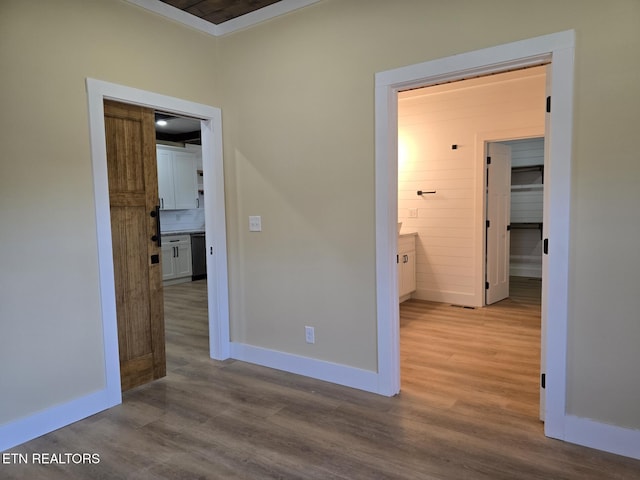 interior space with light wood-type flooring and baseboards