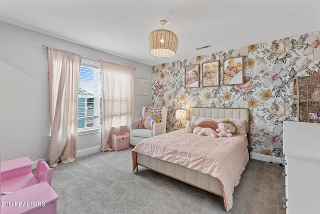 bedroom with light colored carpet