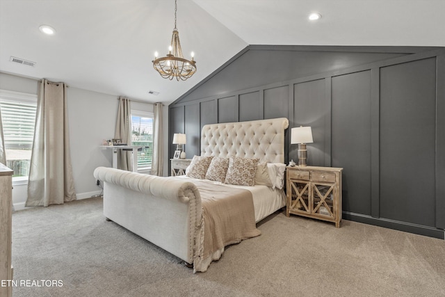 carpeted bedroom with a decorative wall, vaulted ceiling, a notable chandelier, visible vents, and recessed lighting