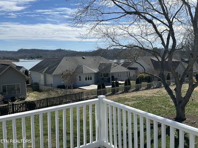 mountain view with a residential view and a water view