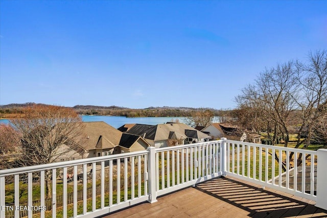 deck featuring a water view