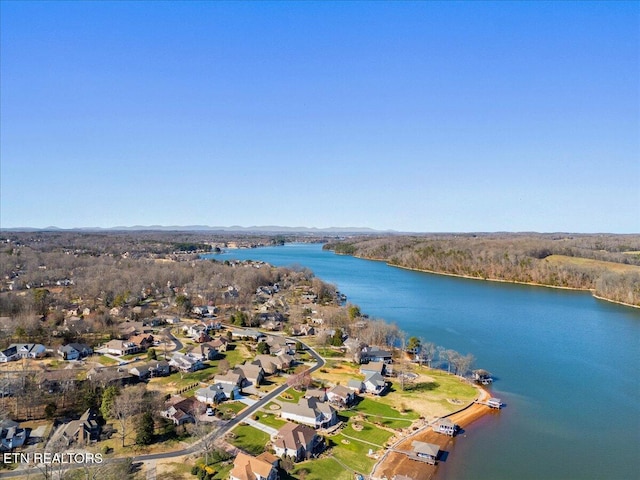 aerial view with a residential view and a water view