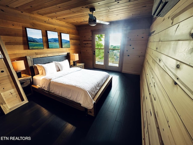 bedroom featuring wood ceiling, access to outside, dark hardwood / wood-style floors, and wood walls