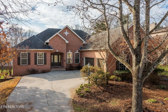 view of front of property featuring a garage