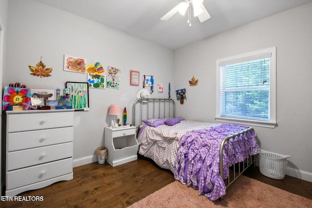 bedroom featuring dark wood-type flooring and ceiling fan