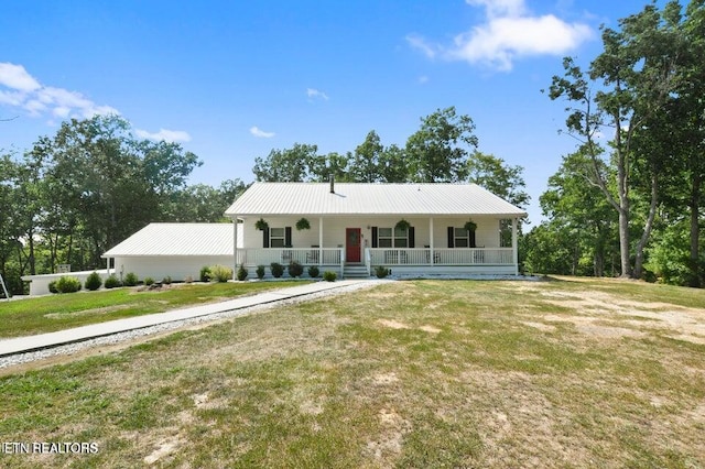 view of front of house with a porch and a front lawn