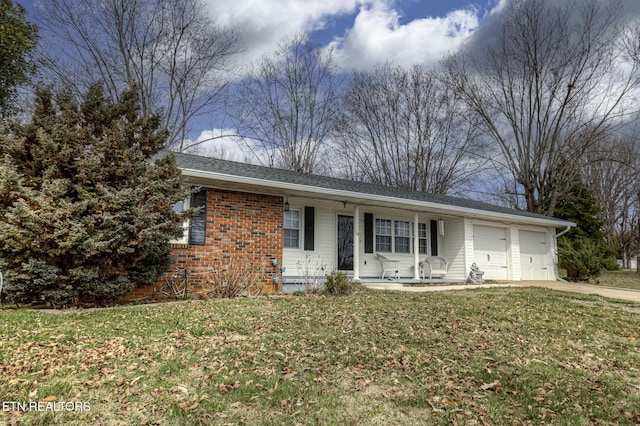 ranch-style home featuring brick siding, a front lawn, concrete driveway, covered porch, and a garage