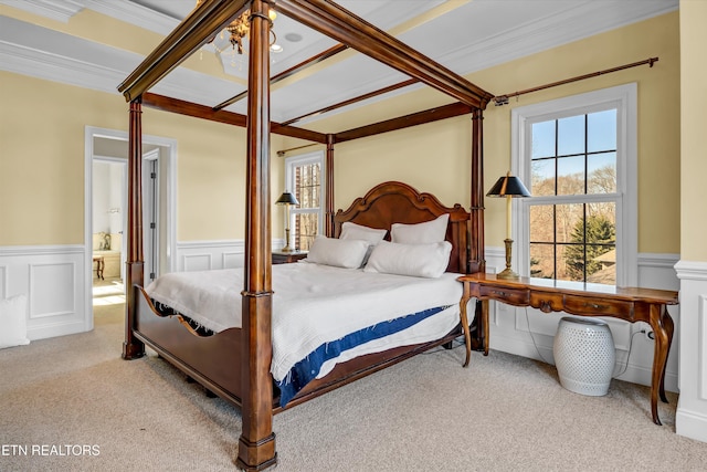 carpeted bedroom with ornamental molding, coffered ceiling, and beam ceiling