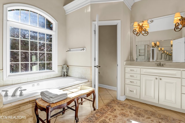 bathroom with crown molding, tile patterned floors, vanity, and tiled tub