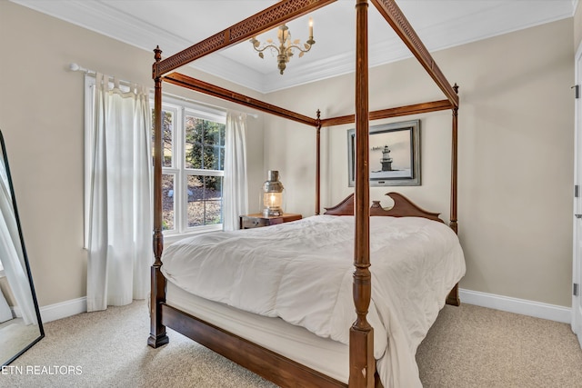 carpeted bedroom featuring ornamental molding and an inviting chandelier