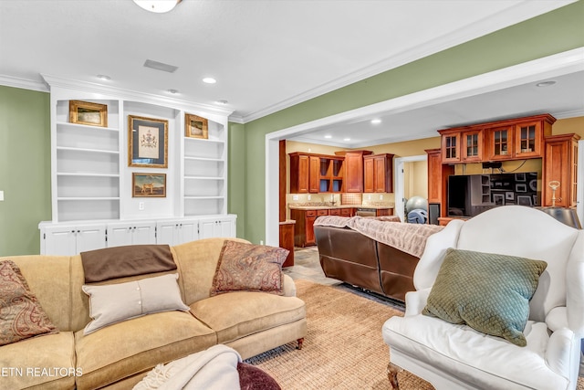 living room featuring crown molding