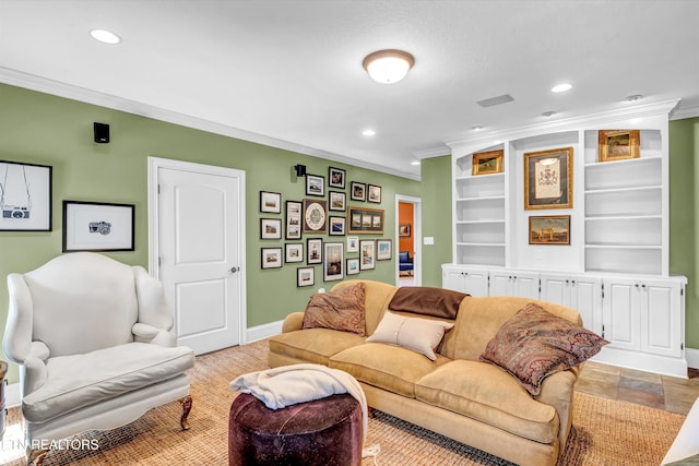 living room featuring crown molding and built in features