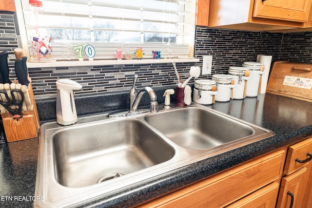 details with sink and decorative backsplash