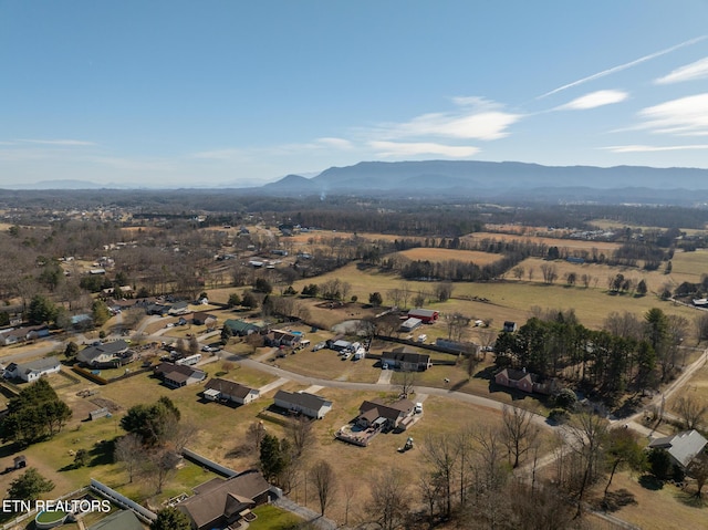 drone / aerial view featuring a mountain view