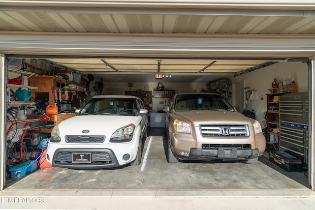 garage featuring a garage door opener