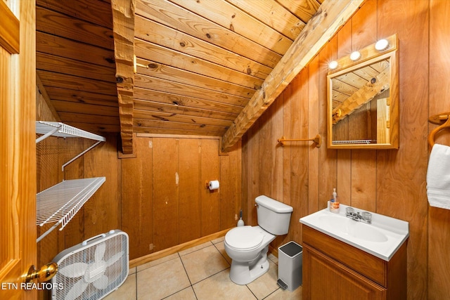 bathroom featuring wooden walls, tile patterned floors, toilet, and wooden ceiling