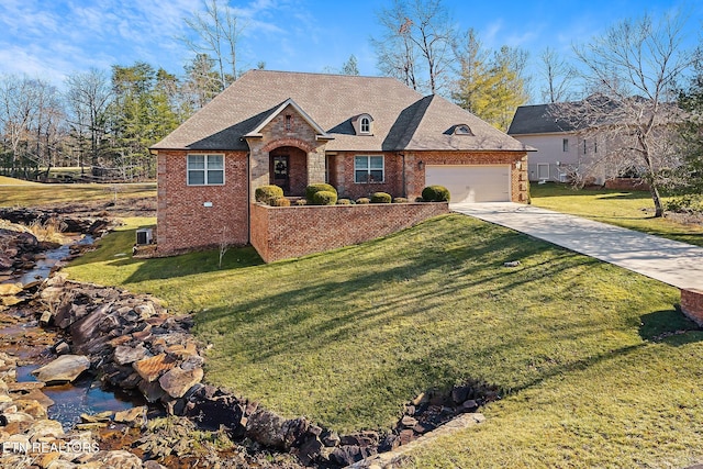 view of front facade with a garage and a front yard