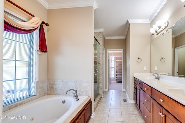 bathroom with ornamental molding, vanity, shower with separate bathtub, and tile patterned floors